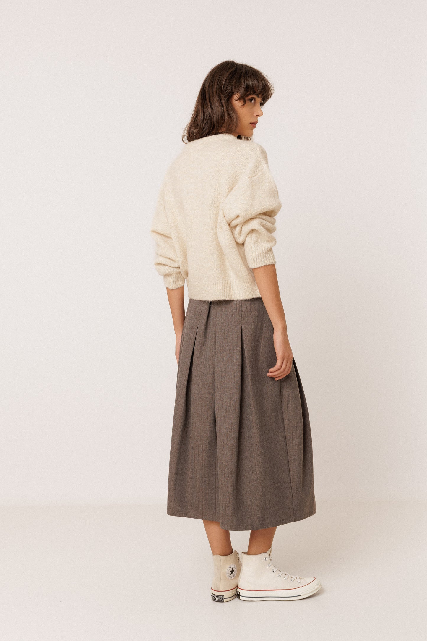 PLEATED CROSSOVER SKIRT